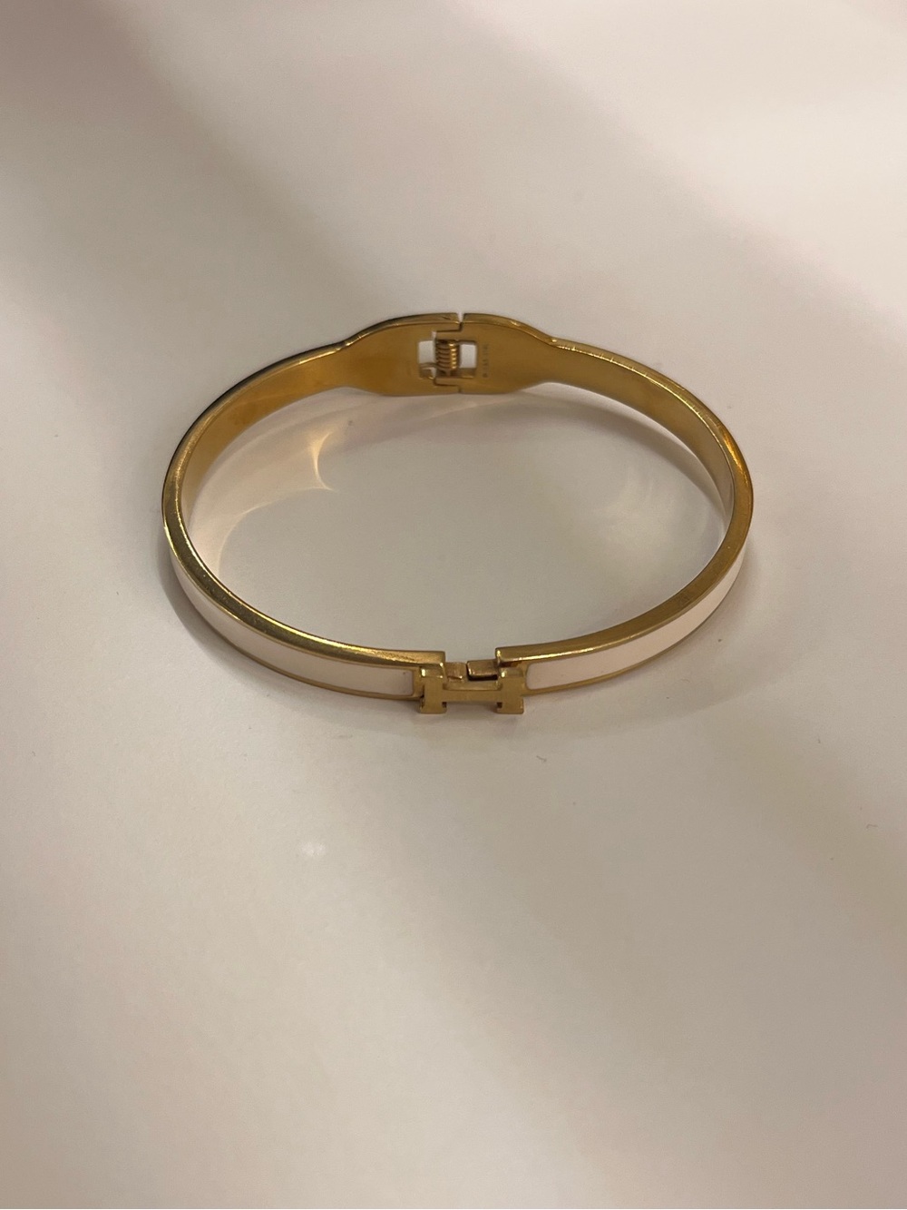 Gold and white women’s H Bracelet